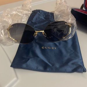 Gucci sunglasses with bag and case